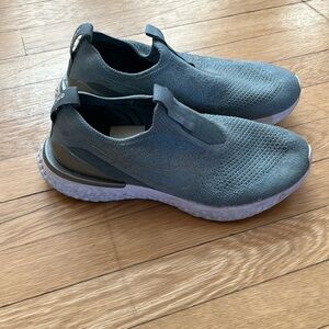 Nike epic react flyknit tennis shoes.